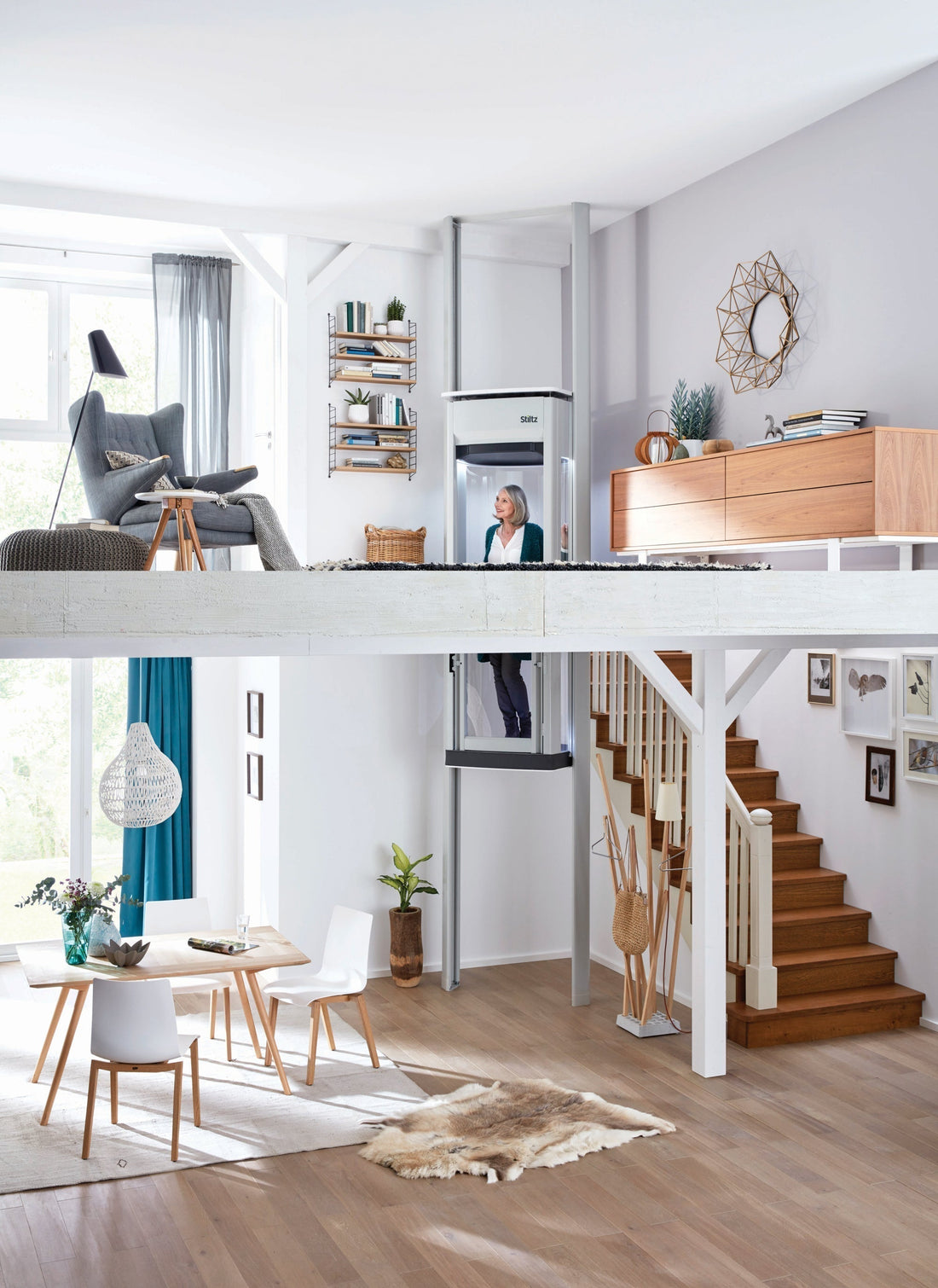 Residential home lift connecting the different levels of a bright split-level house