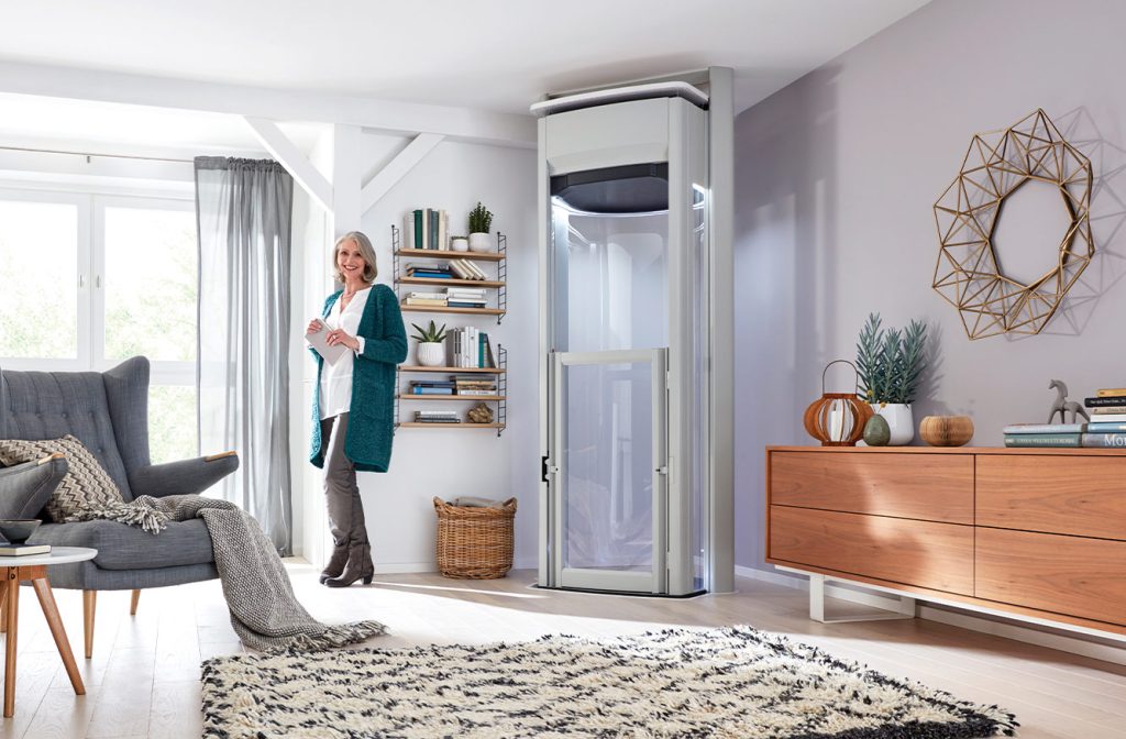 Women Smiling with home lift in her office